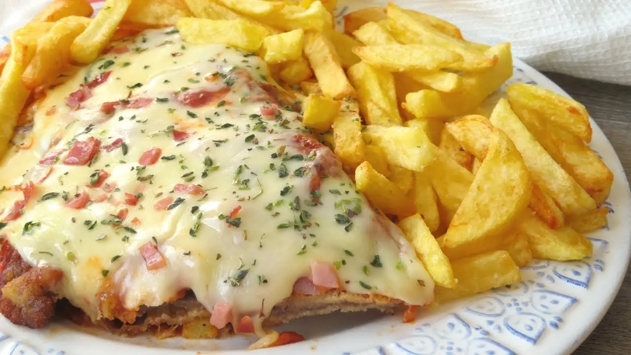 carne a la milanesa con queso - Por qué se llama milanesa